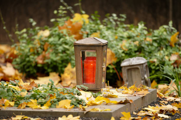 istock close up of a grave lantern on a grave 1443996018