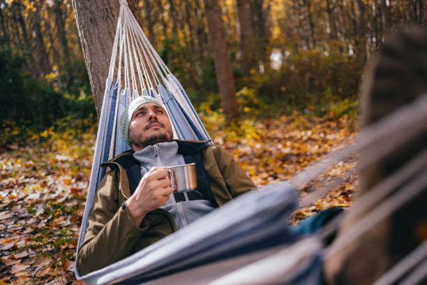 istock Serious Man Relaxing In A Hammock 1443998222
