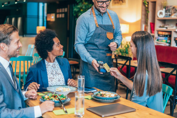 istock Businesswoman contactless payment 1444001925