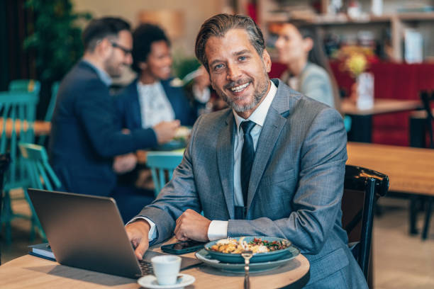 istock Business man working at a restaurant 1444001930
