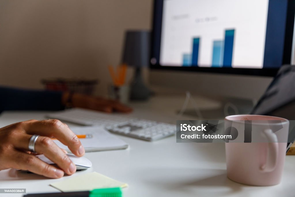 Using A Computer Man Using A Computer Mouse While Working From Home Stock Photo ...