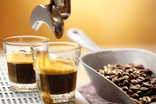 Making espresso coffee from fresh coffee beans