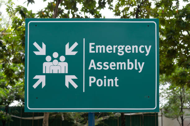 Emergency assembly point sign in the park.