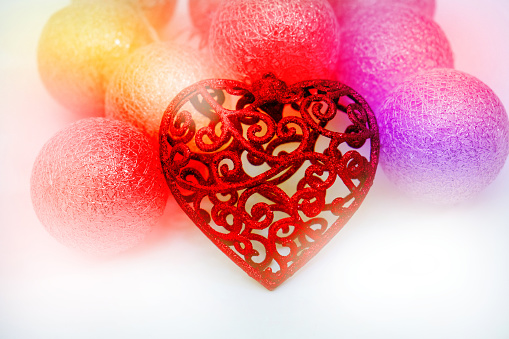 Red carving heart on colorful iridescent background. Greeting gift card background . Valentines Day conccept