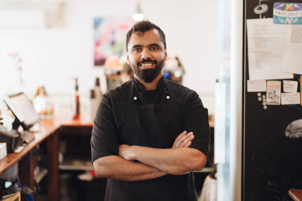 istock Successful business owner looking at camera. 1444028565