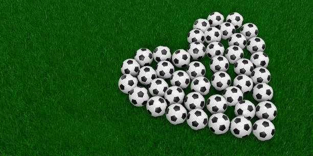 Footbal heart I love football concept: Many white and black leather designed soccer balls shaped to a heart form on stadium background. World countries football championship. 3D render illustration with copy space. Football sport layout template design. stadium playing field grass fifa world cup stock pictures, royalty-free photos & images