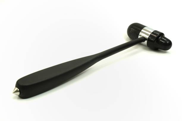 istock Image showing a black reflex hammer for osteoarthritis examination on a white background, isolated. 1444037492