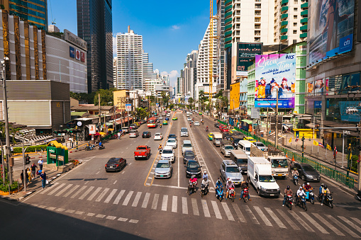 Bangkok, Thailand - November 16, 2019 :  Traffic moment in afternoon on Asoke junction at downtown of Bangkok, Thailand
