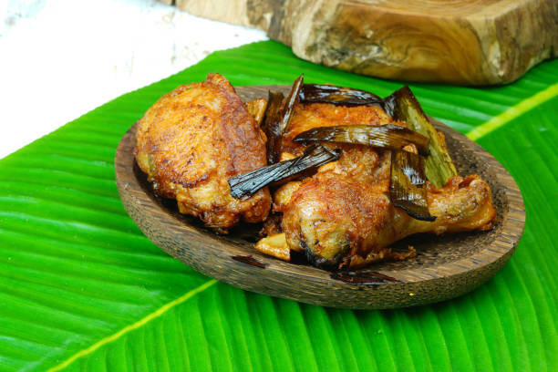 Ayam goreng kampung or traditional fried chicken from Indonesia stock photo