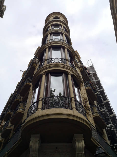 istock Old fashioned residential corner building in Barcelona, Spain 1444057379