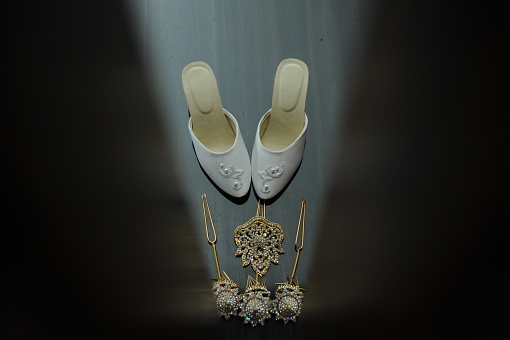 White shoes and aesthetic necklace decoration