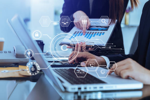 istock Copyright or patent concept, Business team analyzing data and using smart phone and tablet with virtual screen copyright icon trademark license, Creation ownership against piracy. 1444063445