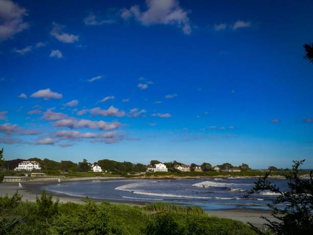 istock Bright blue sky over the water on Bailey's Beach, Rhode Island 1444065264