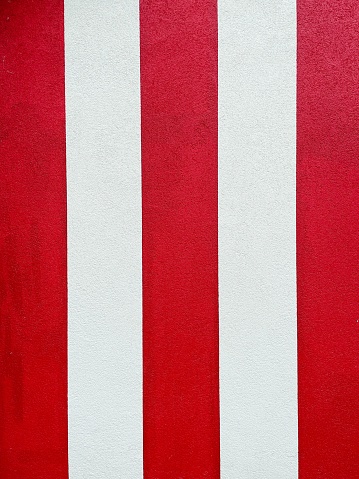 An illustration of red and white vertical stripes