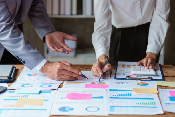 istock Business people brainstorming data target financial on financial document paperwork. business finance and discuss concept 1444068985
