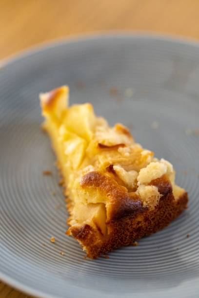 istock Portion of appetizing apple pie on a gray plate 1444069154
