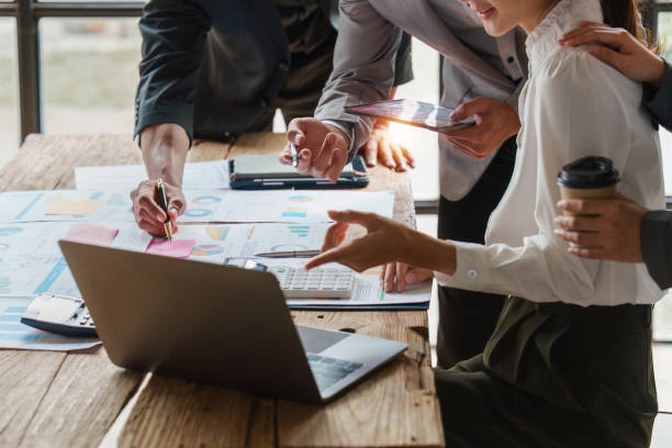 istock Business people brainstorming data target financial on financial document paperwork. business finance and discuss concept 1444069932