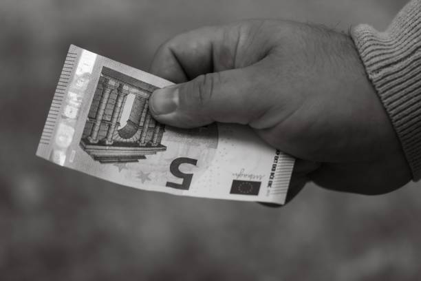 istock Money euro coins and banknotes 1444070347