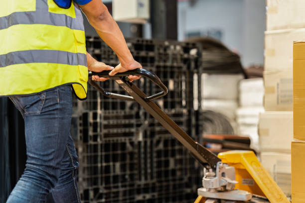 istock Working at warehouse. Male warehouse worker checking in storage department. Employee organizing goods distribution to the market. 1444072852