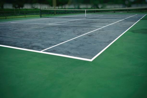Close up Corner of Tennis Court Background. Close up Corner of Tennis Court Background. baseline stock pictures, royalty-free photos & images