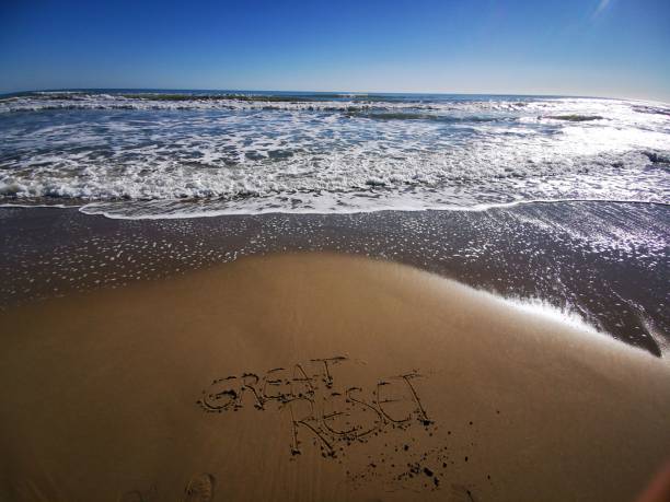 A sandy beach with a \