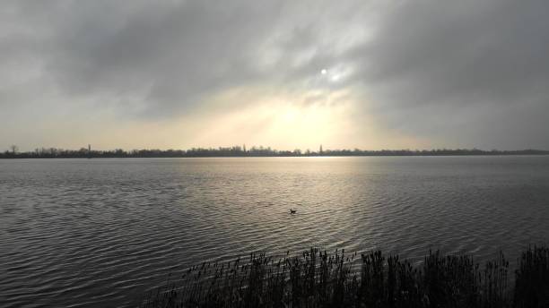 Calm big lake on a cloudy day