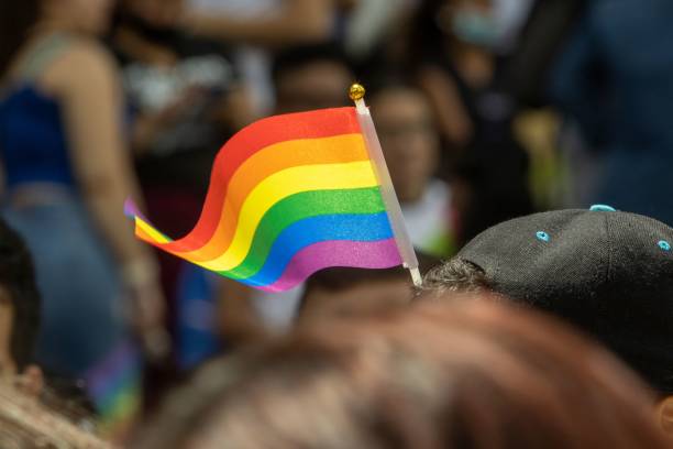 istock Closeup of LGBT flag in blurred background 1444082997