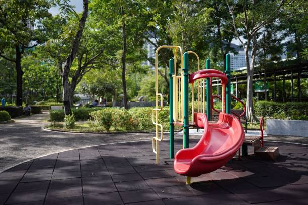 istock Empty playground in a park on a sunny day 1444083402