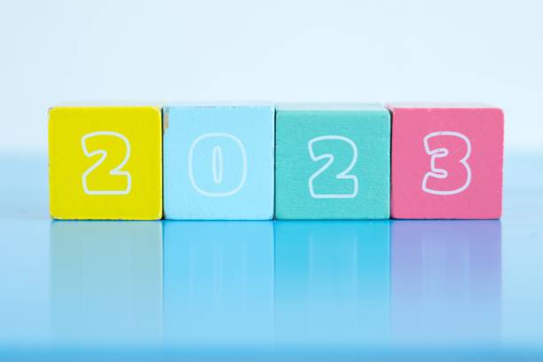 istock Cubes with the numbers 2023 on it isolated on a blue gradient background 1444084584