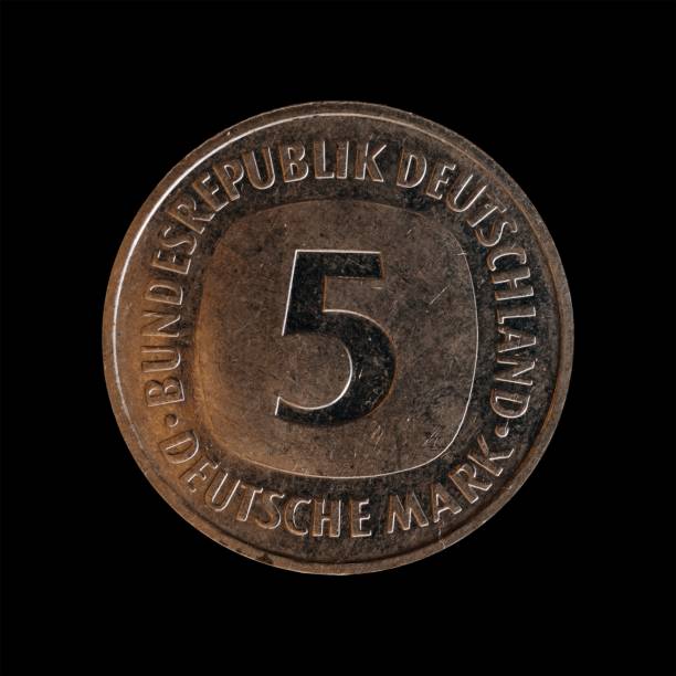 istock Close up of a five Deutsche mark isolated on black background. 1444084757