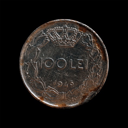 A closeup of Romanian Coin 100 Lei Mihai I - 1944 on the black background