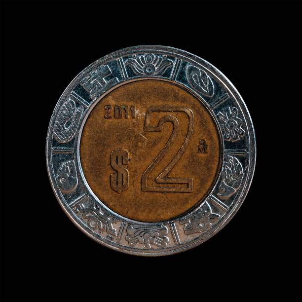 istock Old coin isolated on a black background 1444084958