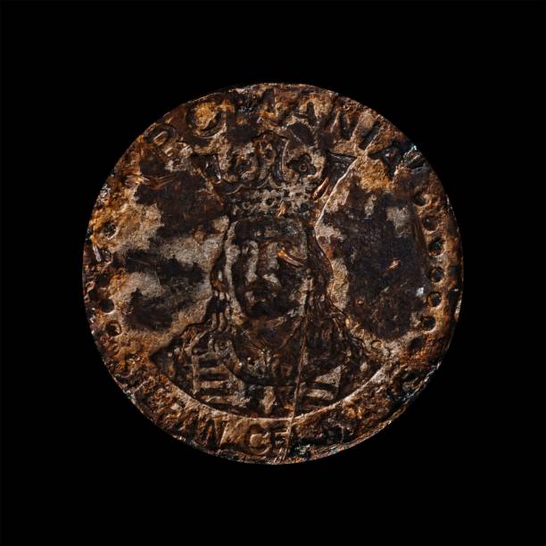 istock Old coin isolated on a black background 1444084984