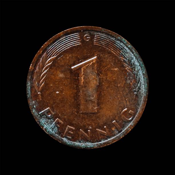 istock Old coin isolated on a black background 1444085020