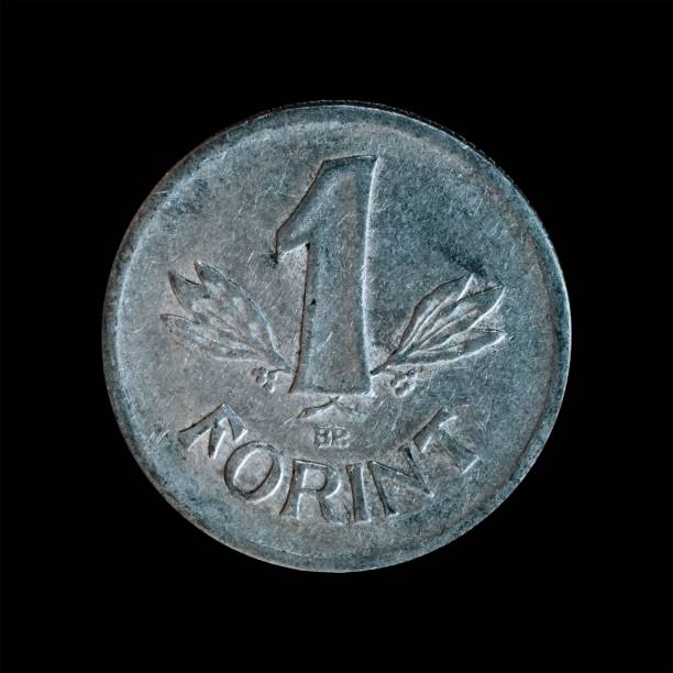 istock Old coin isolated on a black background 1444085059