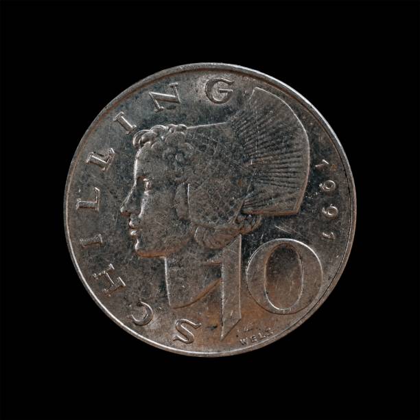 istock Old coin isolated on a black background 1444085073