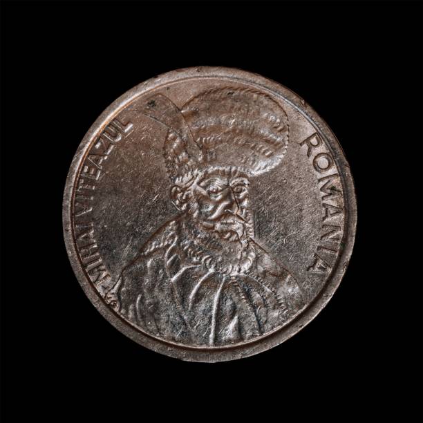 istock Romanian hundred Lei coin isolated on a black background 1444085348