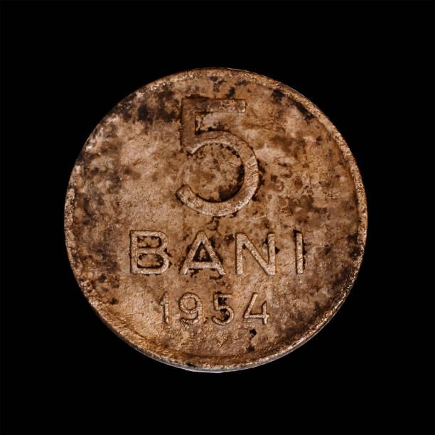 istock Vintage five bani coin isolated on black background. 1444085350