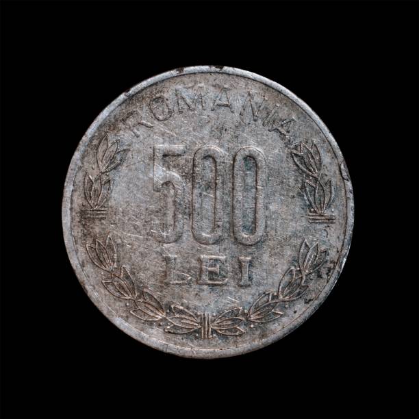 istock Romanian 500 Lei coin isolated on a black background 1444086128