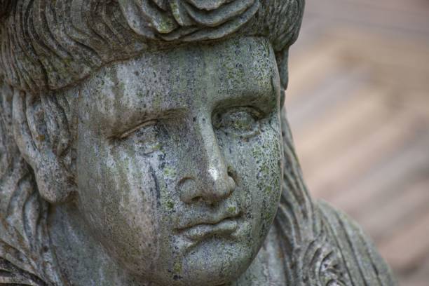 istock Closeup of a stone sculpture's face. 1444086975