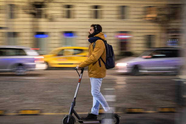 istock Commuting through the city with scooter 1444088730