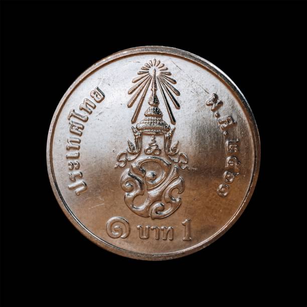 istock Old coin isolated on a black background 1444088963