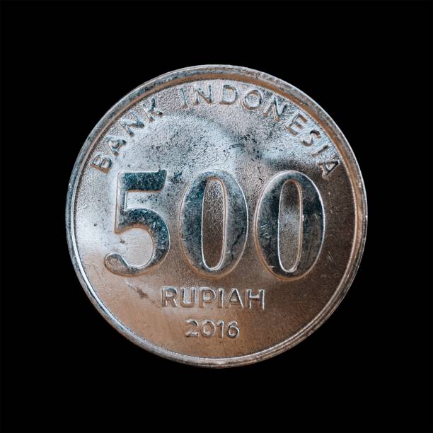 istock Old coin isolated on a black background 1444088979