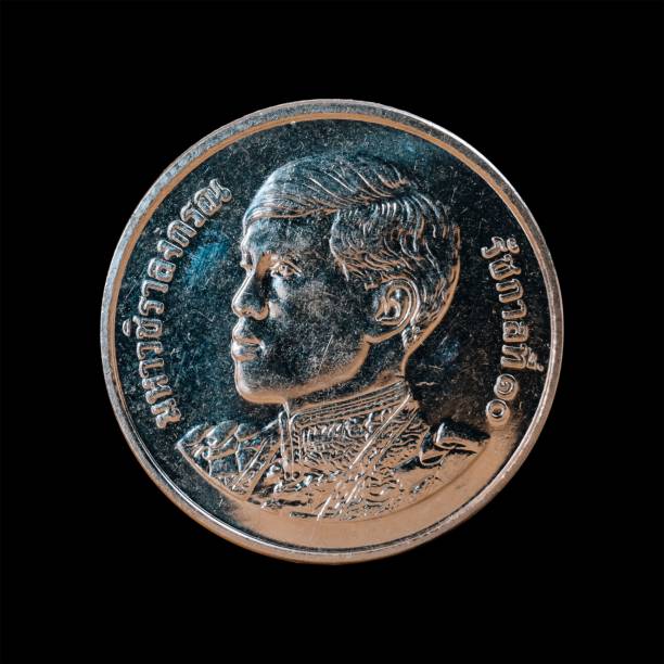 istock Old coin isolated on a black background 1444089001