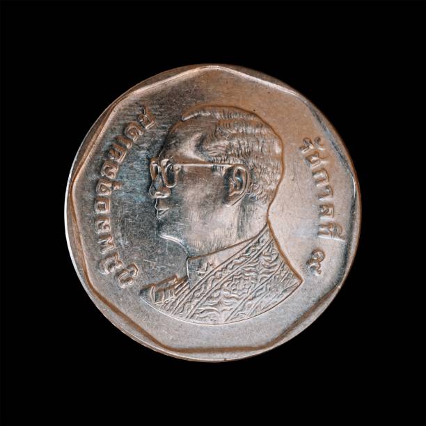 istock Old coin isolated on a black background 1444089632