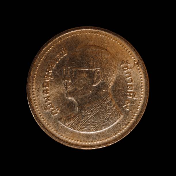 istock Old coin isolated on a black background 1444089636