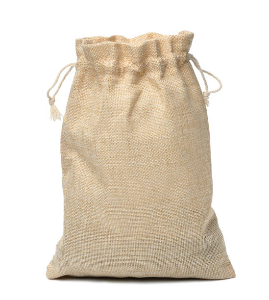 istock Full canvas bag tied with rope and isolated on a white background 1444091818