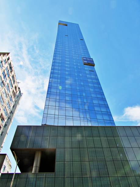 istock Low Angle View Of Modern Glass Building Against Sky 1444097957