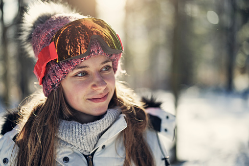 Portrait of a teenage girl enjoying the winter day.\nCanon R5