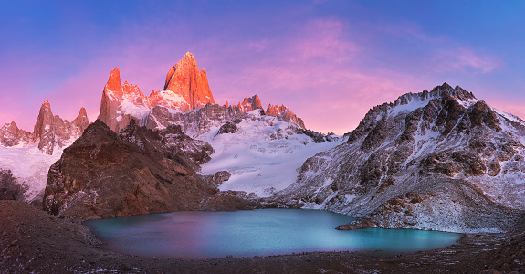 Fitzroy's red burning peak and Laguna-De-los-Tres at sunrise, Patagonia, Argentina. South America